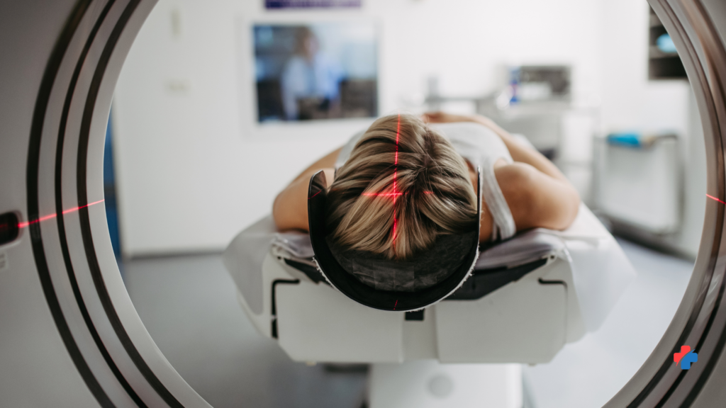 Patient receiving diagnostic imaging for evaluation of an eye injury in the emergency room