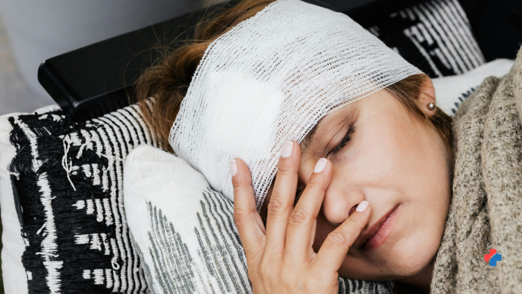 Woman resting with head bandage and eye discomfort following traumatic injury evaluated in the emergency room